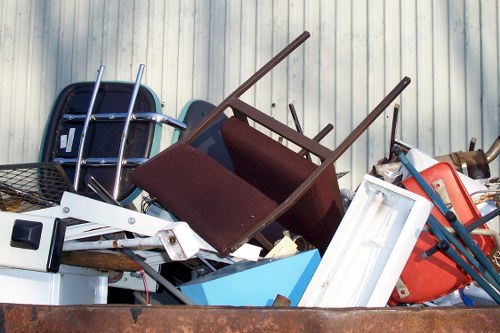 Residential skip container in a Penge garden